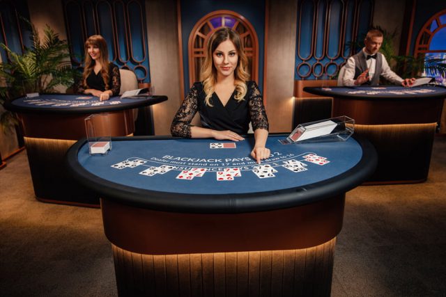 Female live blackjack dealer