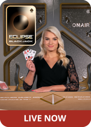 Female game presenter holding up two cards behind a blackjack table, featuring the Eclipse Blackjack logo and 'Live Now'.