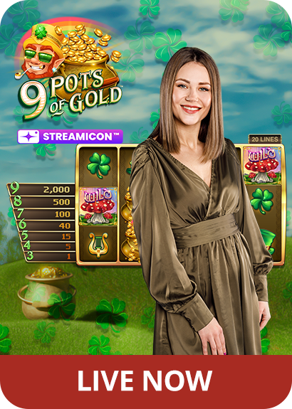 Female game presenter in front of a slots screen from 9 Pots of Gold, near the game's logo, reading 'Live Now'.